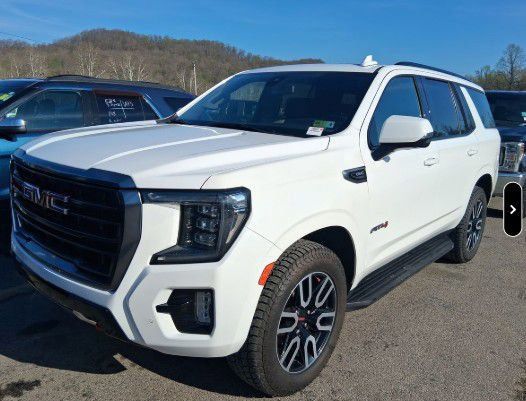 Summit White 2021 GMC Yukon AT4 4WD SUV / Crossover Four-Wheel Drive