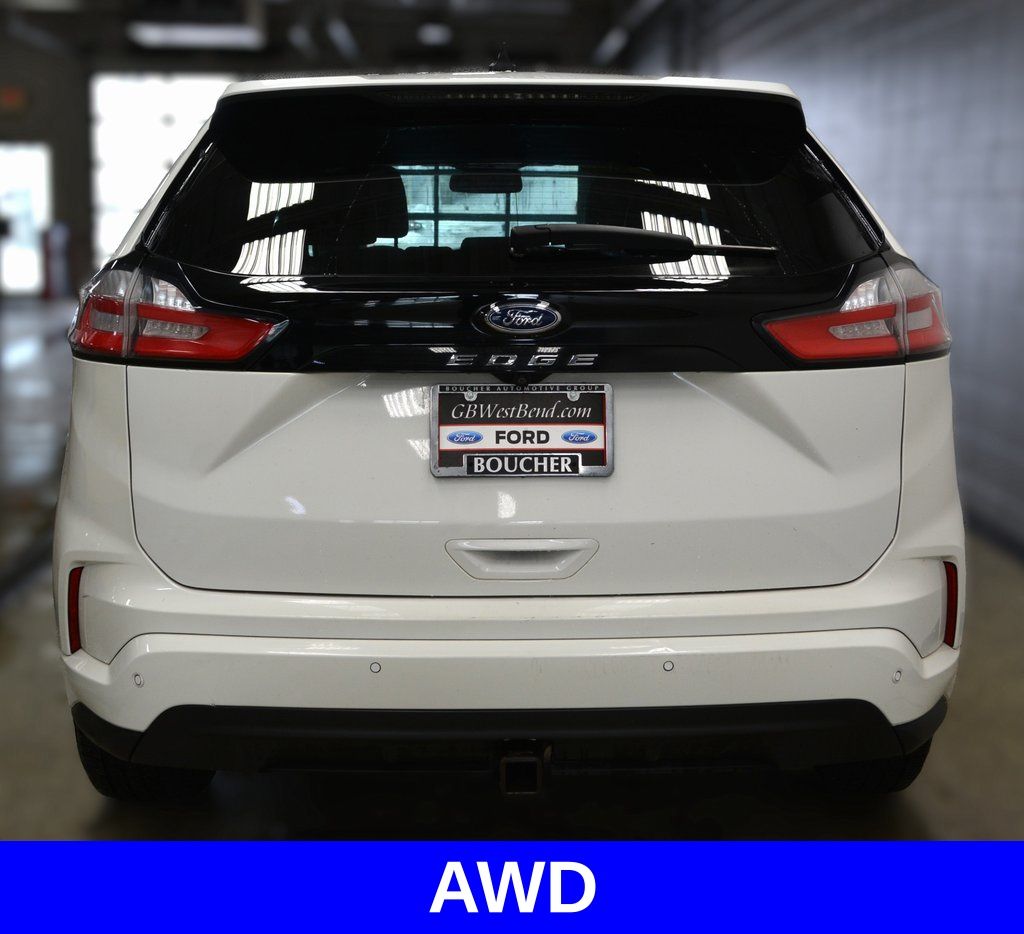 Used 2022 Star White Metallic Tri-Coat Ford ST Line image 5