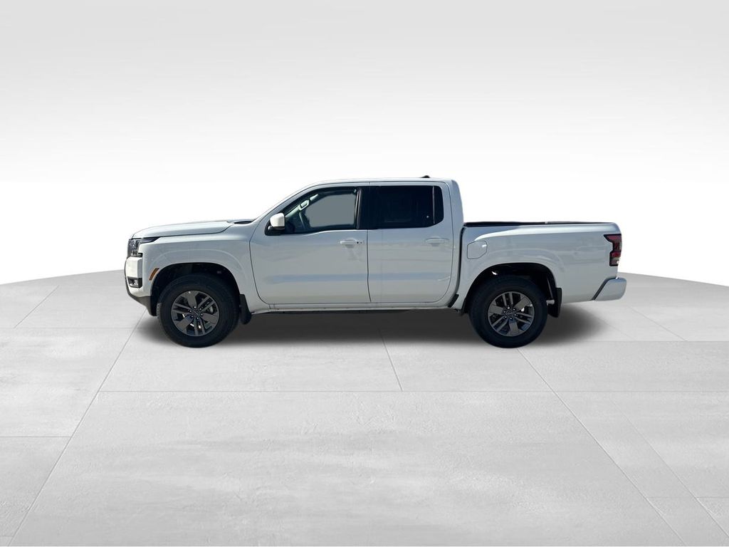 2025 Glacier White Nissan Frontier SV 4X4 Truck