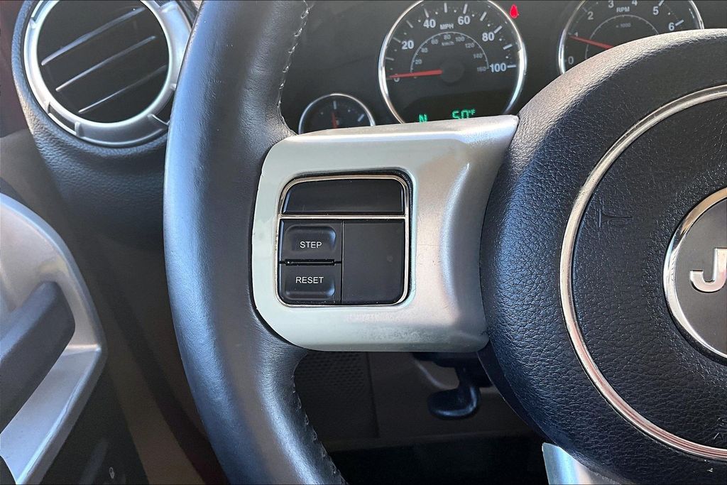 Used 2013 Red Jeep Unlimited Sahara image 12