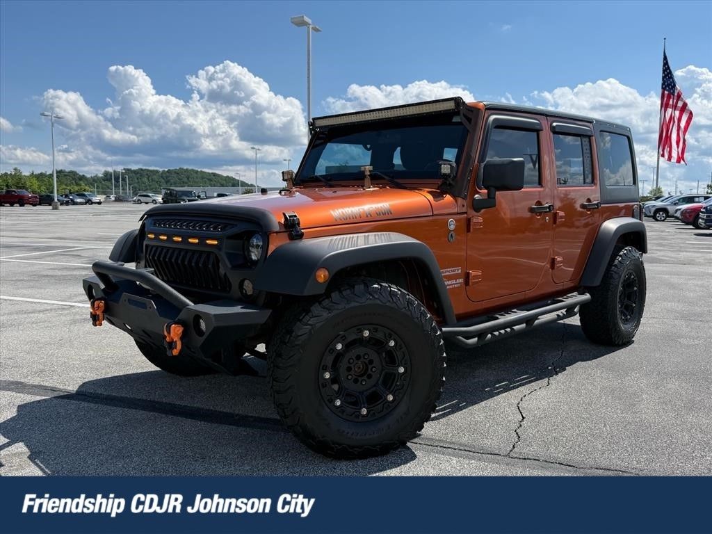 Orange (Mango Tango Pearlcoat) 2011 Jeep Wrangler Unlimited Sport 4WD SUV / Crossover Four-Wheel Drive 6-Speed Manual