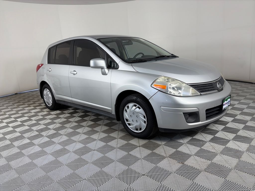 Brilliant Silver Metallic 2009 Nissan Versa Sedan Front-Wheel Drive 4-Speed Automatic