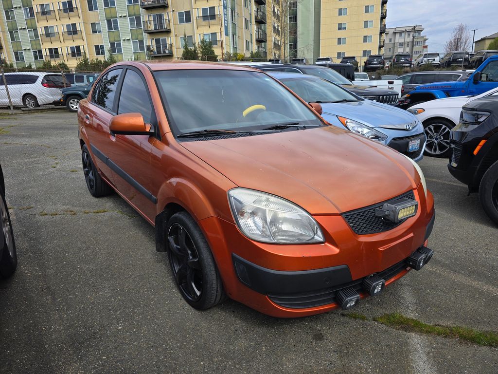 Orange 2008 Kia Rio LX Sedan Front-Wheel Drive 4-Speed Automatic Overdrive