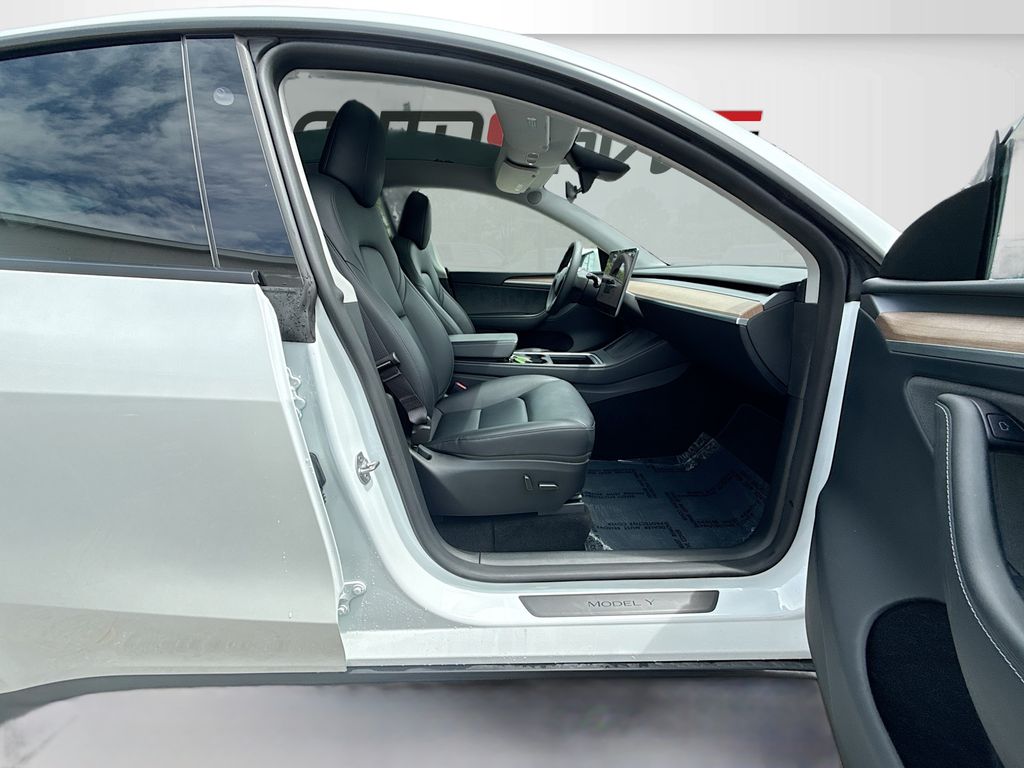 2024 Tesla Model Y Long Range White at AutoSavvy Houston Southwest