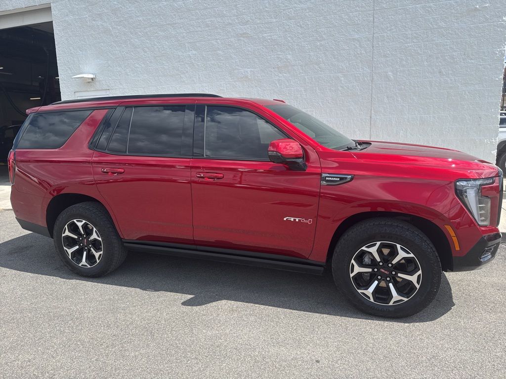 Volcanic Red Tintcoat 2025 GMC Yukon AT4 4WD SUV / Crossover Four-Wheel Drive