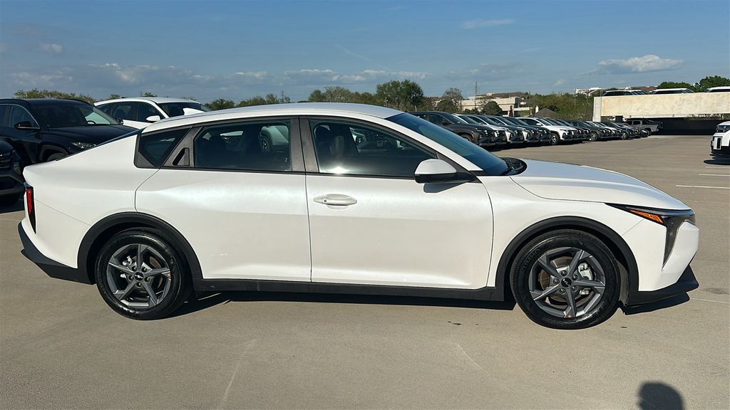 2025 Kia K4 LXS White at Shottenkirk Kia Fort Bend