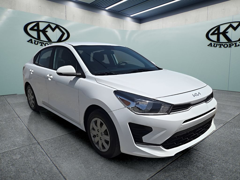 Clear White 2023 Kia Rio Sedan Front-Wheel Drive Continuously Variable Transmission