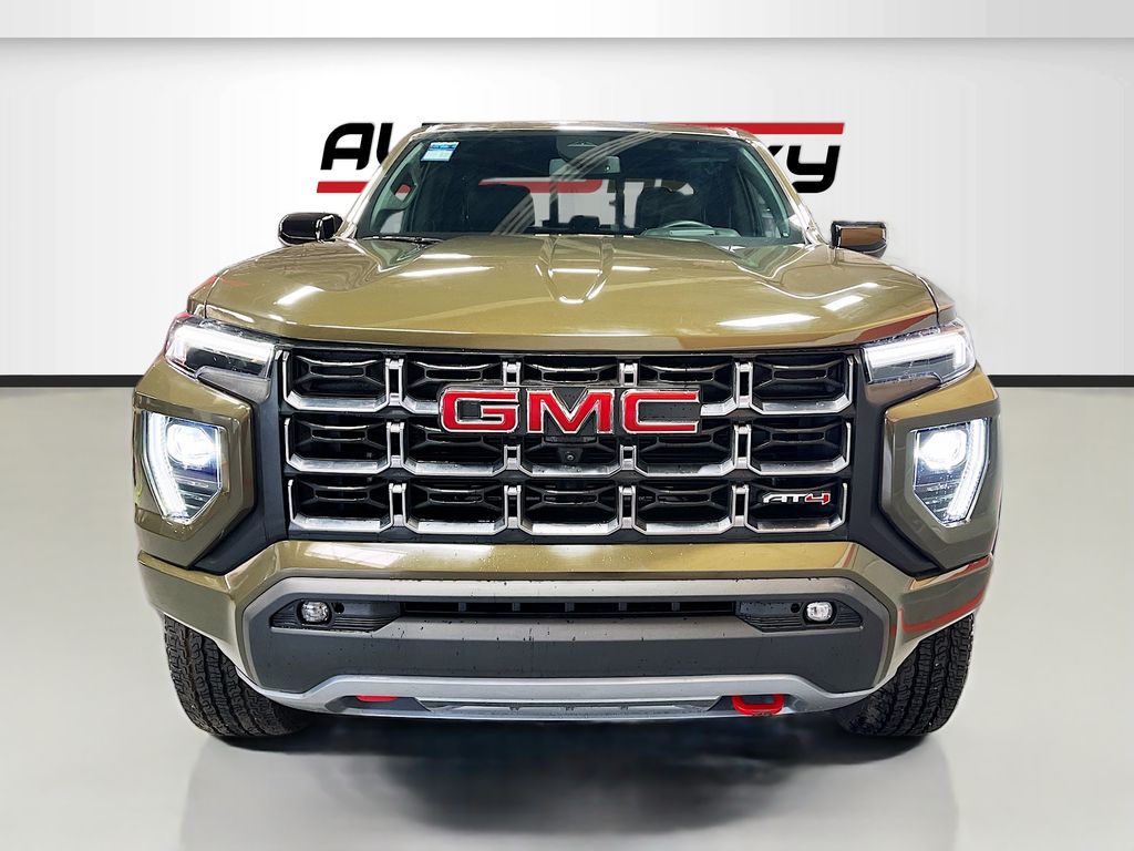 Used 2023 Deep Bronze Metallic GMC AT4 image 2