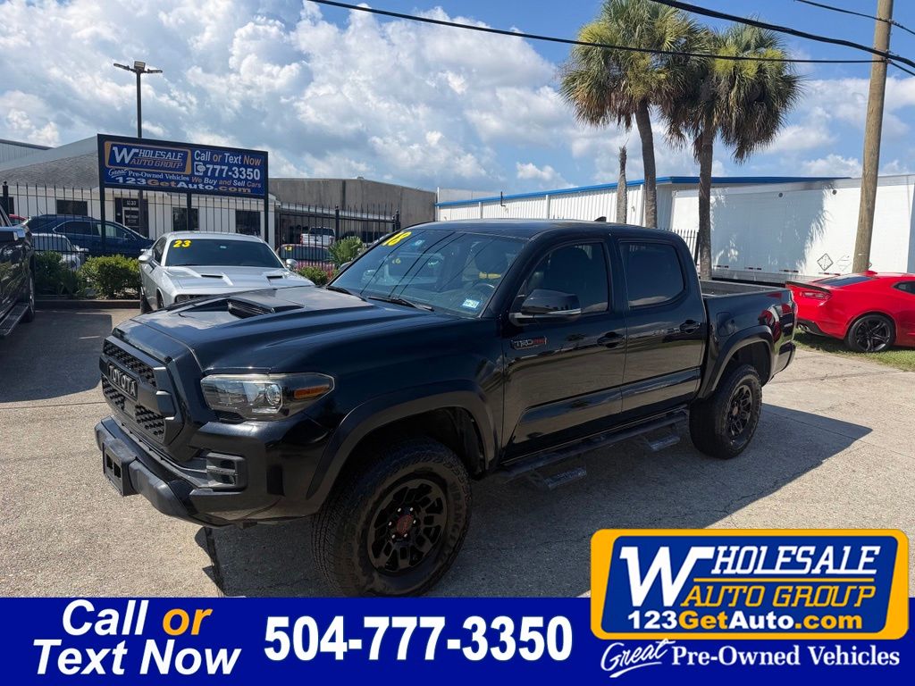 Midnight Black Metallic 2018 Toyota Tacoma Pickup Truck Four-Wheel Drive 6-Speed Automatic