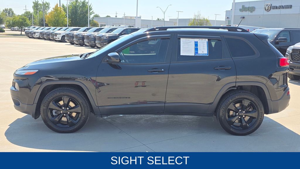 Used 2015 Jeep Cherokee Altitude with VIN 1C4PJMCS0FW792656 for sale in Kansas City