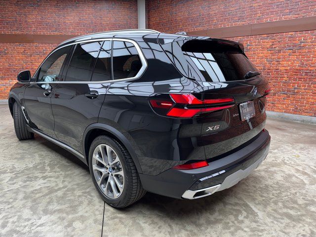 Used 2025 Black BMW xDrive50e image 3