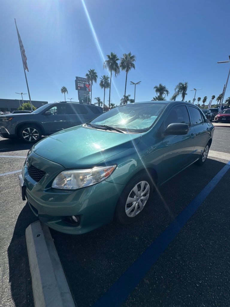 Capri Sea Metallic 2009 Toyota Corolla Sedan Front-Wheel Drive 4-Speed Automatic