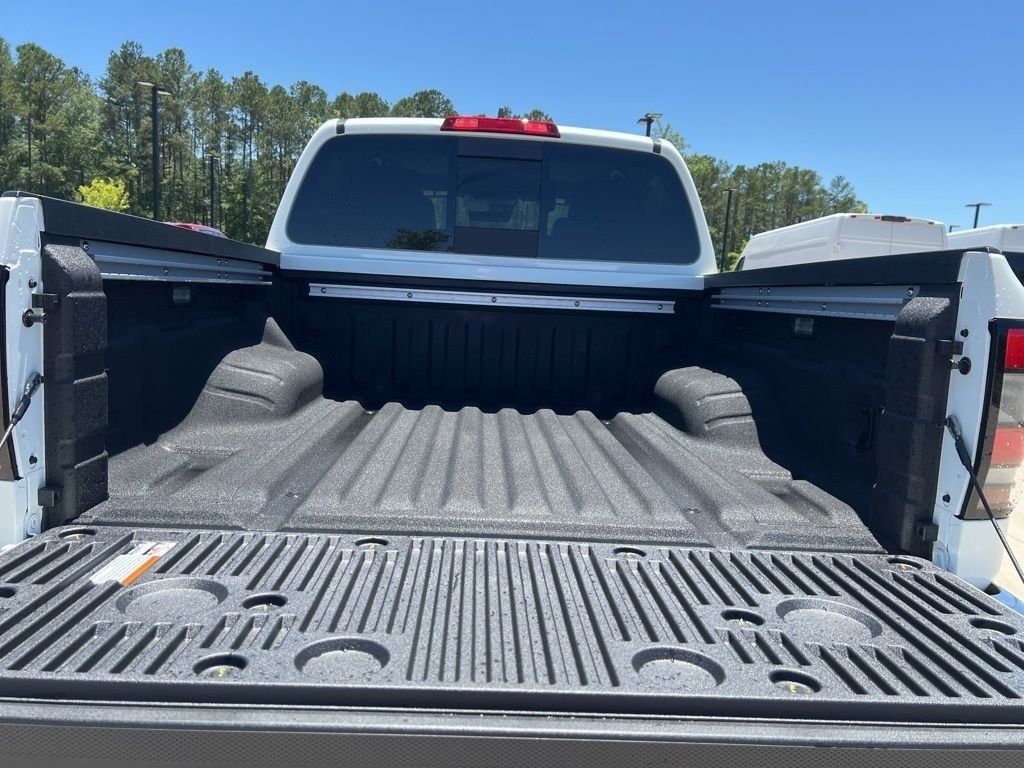 2025 Glacier White Nissan Frontier PRO-4X 4X4 Truck