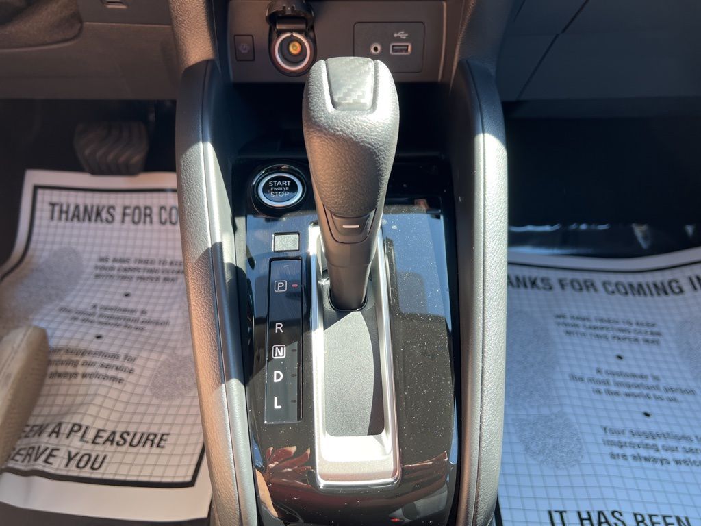 2025 Gray Sky Pearl Nissan Versa 1.6 SV FWD Sedan