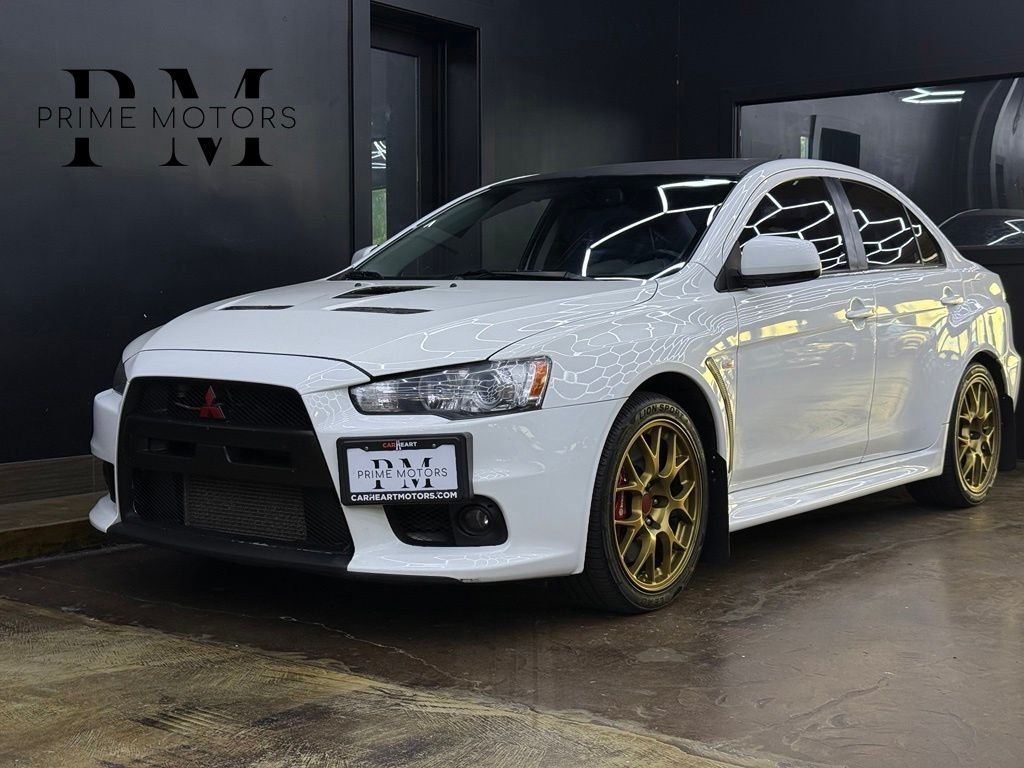 White 2012 Mitsubishi Lancer Evolution Sedan All-Wheel Drive 6-Speed Automatic