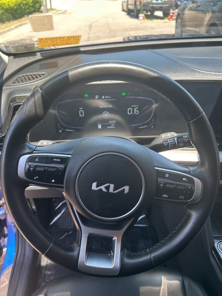 Used 2023 Blue Kia EX image 13