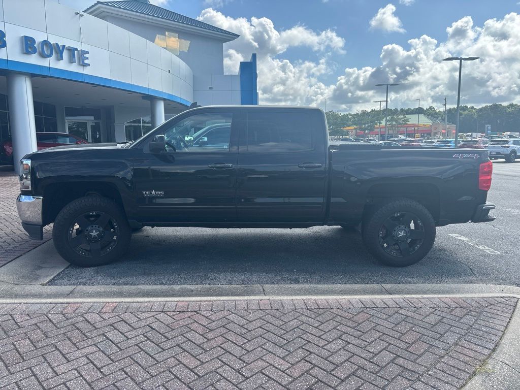Black 2016 Chevrolet Silverado 1500 Pickup Truck Four-Wheel Drive 6-Speed Automatic Overdrive