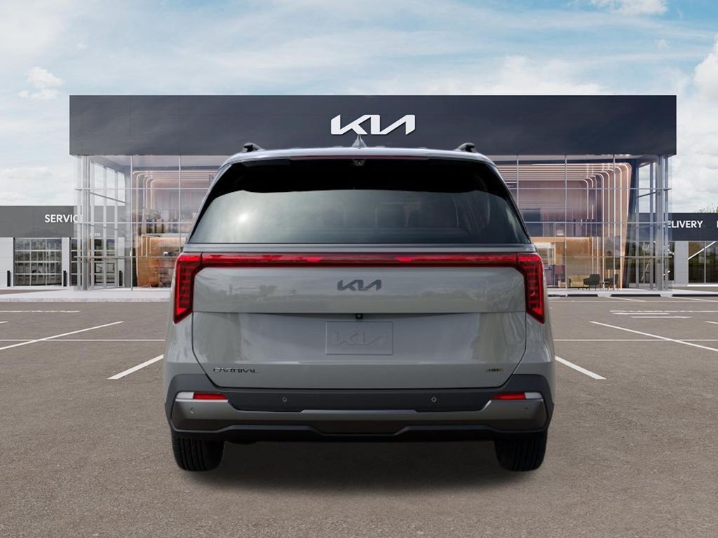 2027 Kia Carnival Hybrid SX PRESTIGE AUTO White at Shottenkirk Kia Fort Bend