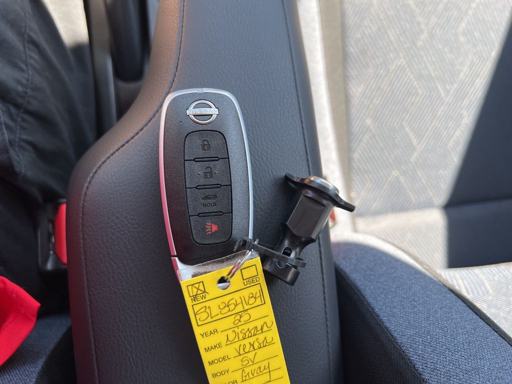 2025 Gray Sky Pearl Nissan Versa 1.6 SV FWD Sedan