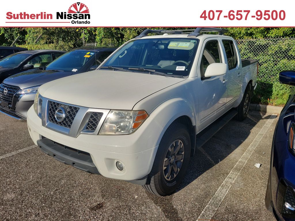 Glacier White 2015 Nissan Frontier Pickup Truck Four-Wheel Drive 5-Speed Automatic Overdrive