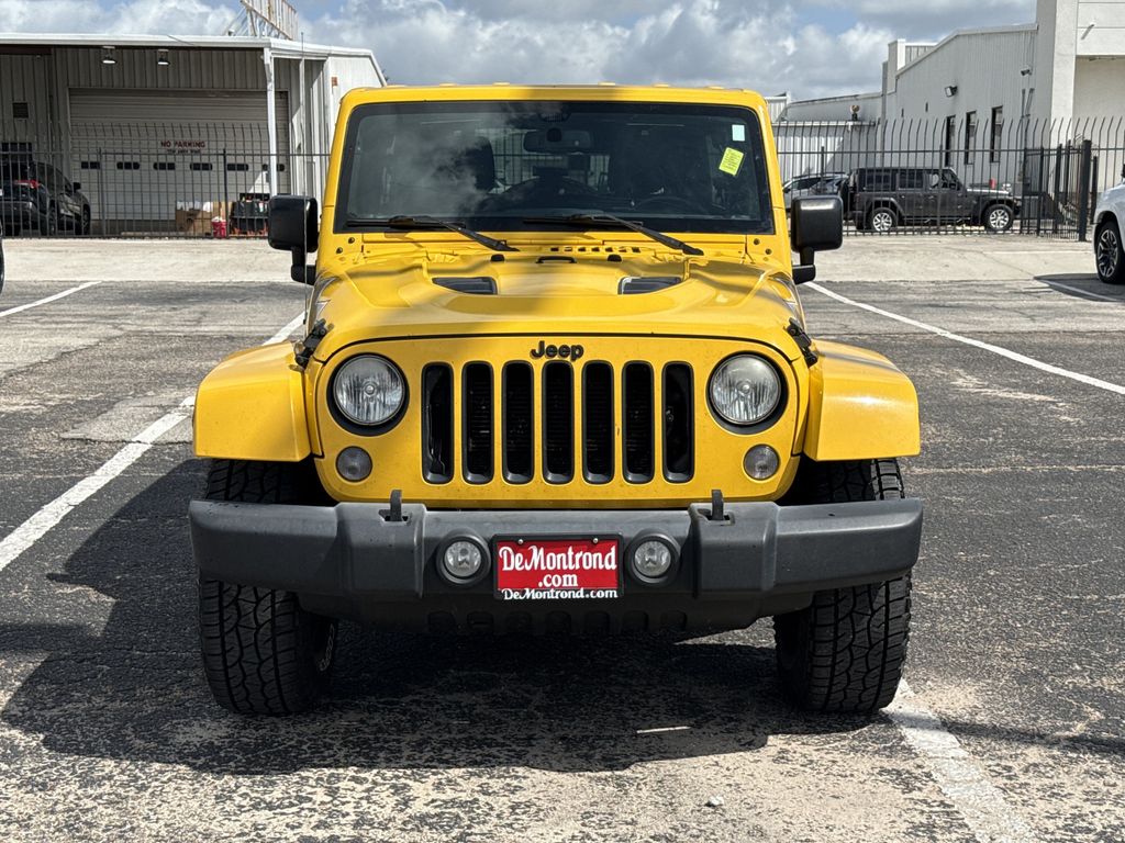 2015 Jeep Wrangler Unlimited Sahara Yellow at Parkway Family Mazda