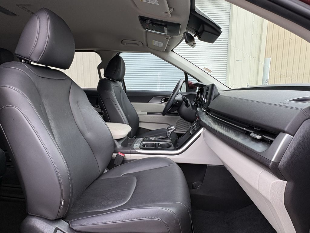 2024 Kia Carnival LX Red at Classic Chevrolet Galveston