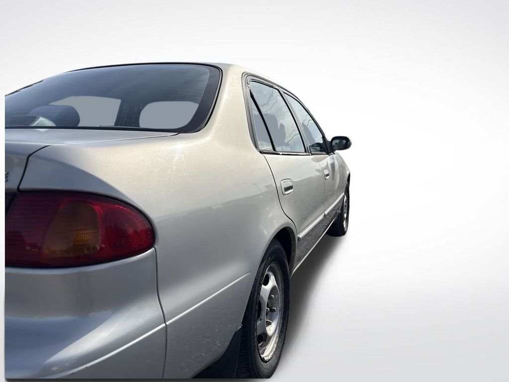 2000 Silver Stream Opal Toyota Corolla LE FWD Sedan