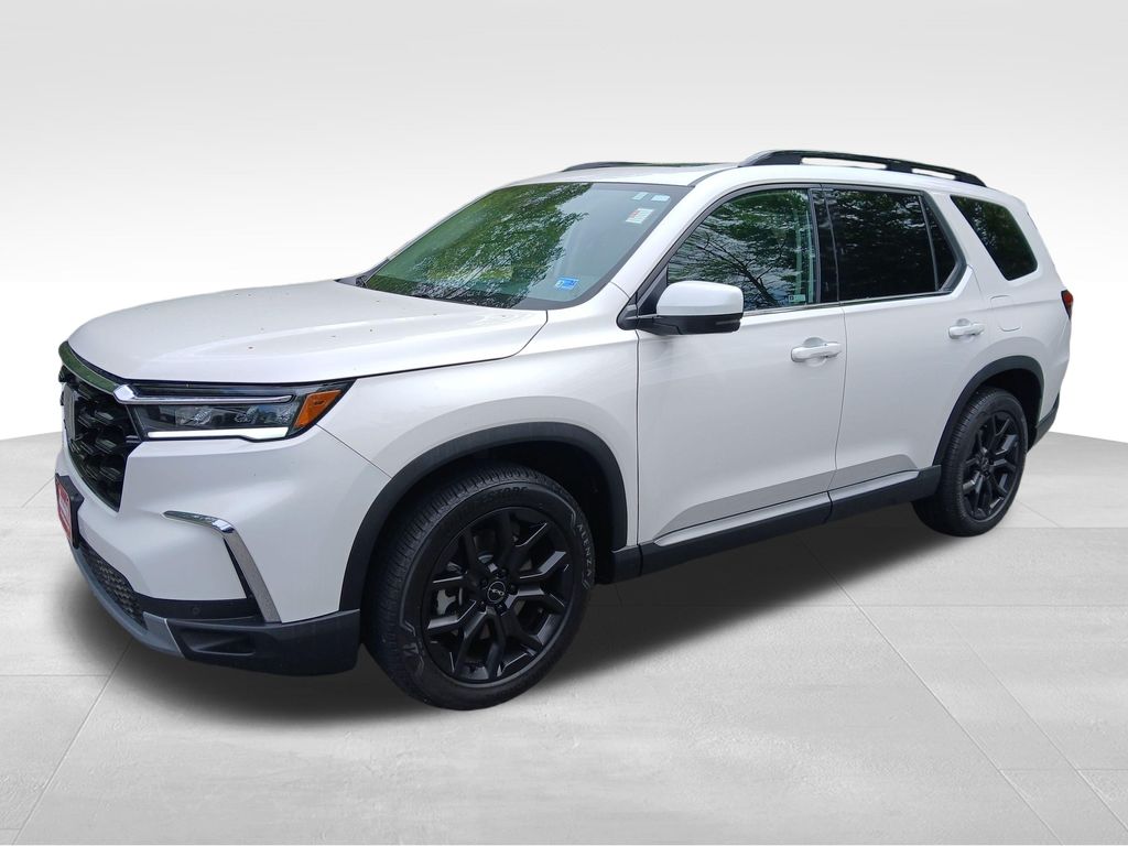 View vehicle photo 3