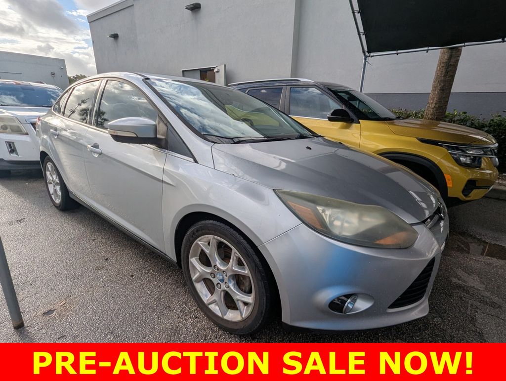 Ingot Silver 2013 Ford Focus Titanium Sedan Front-Wheel Drive 6-Speed Automatic
