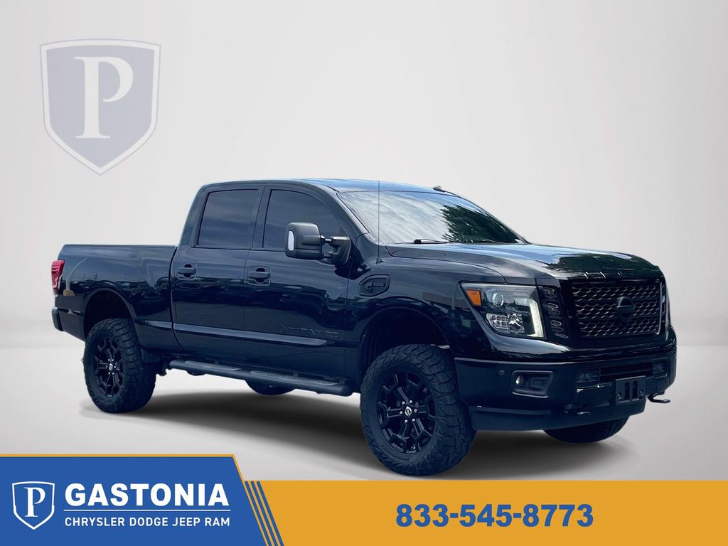Gray (Magnetic Black Metallic) 2019 Nissan Titan XD SV Crew Cab 4WD Pickup Truck Four-Wheel Drive 6-Speed Automatic