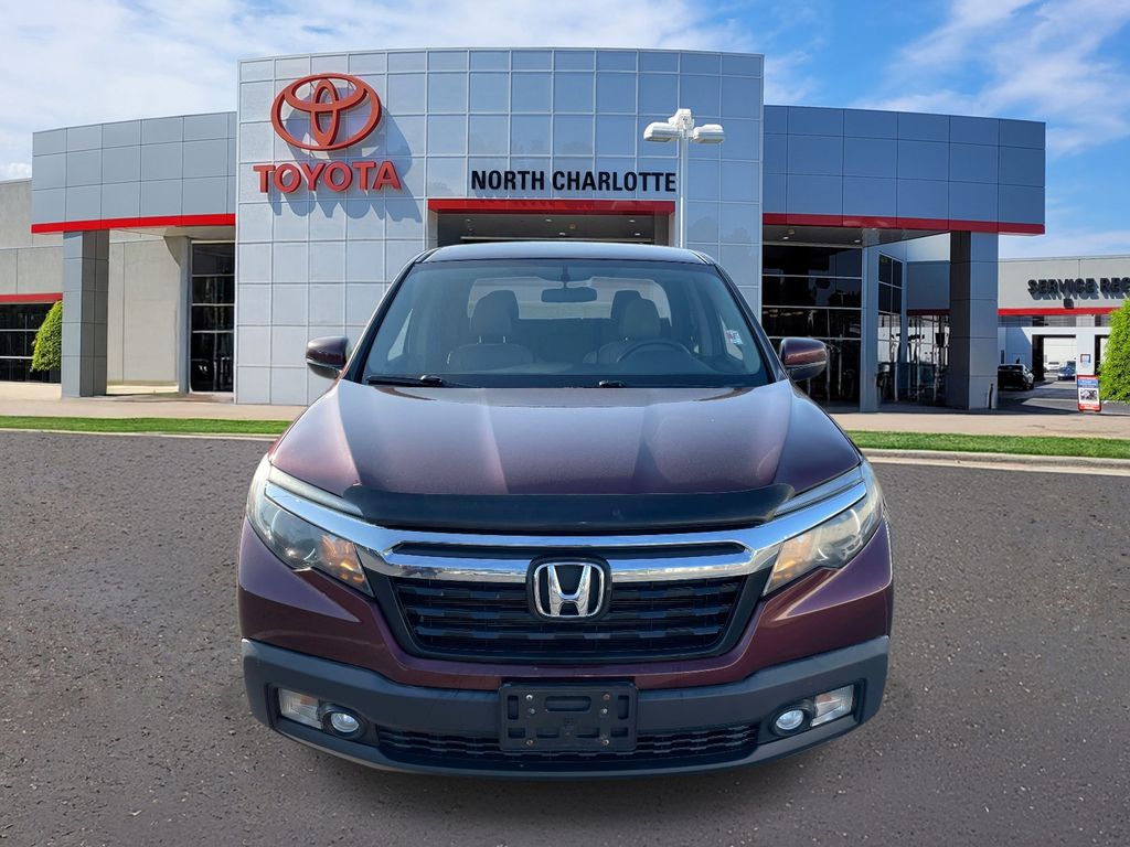 View vehicle photo 3