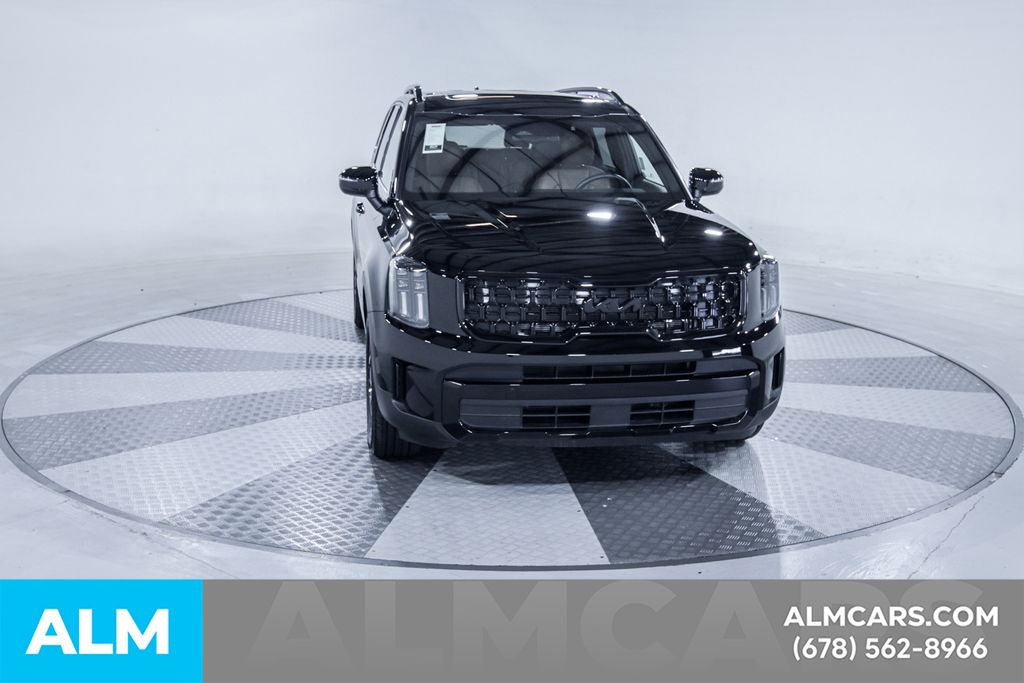 Used 2025 Black Kia EX X-Line image 15