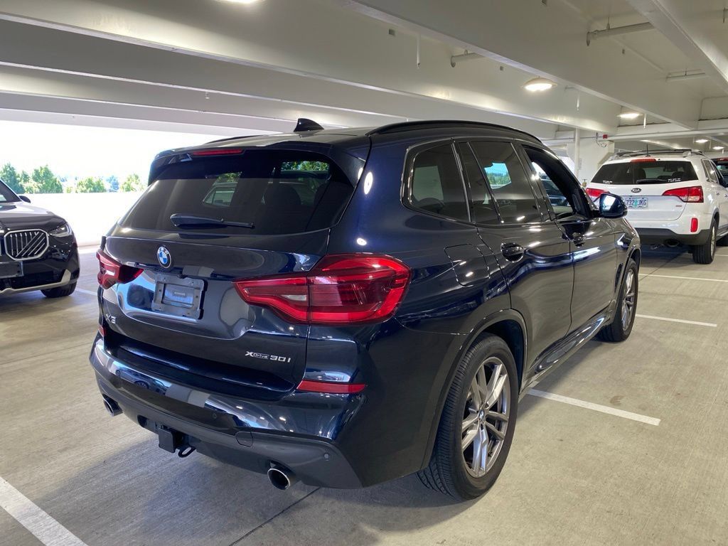 Used 2021 Carbon Black Metallic BMW xDrive30i image 4