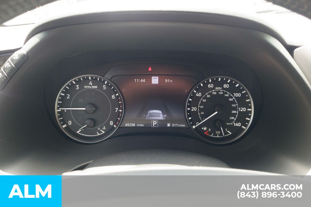 Used 2023 Blue Pearl Nissan Platinum image 12
