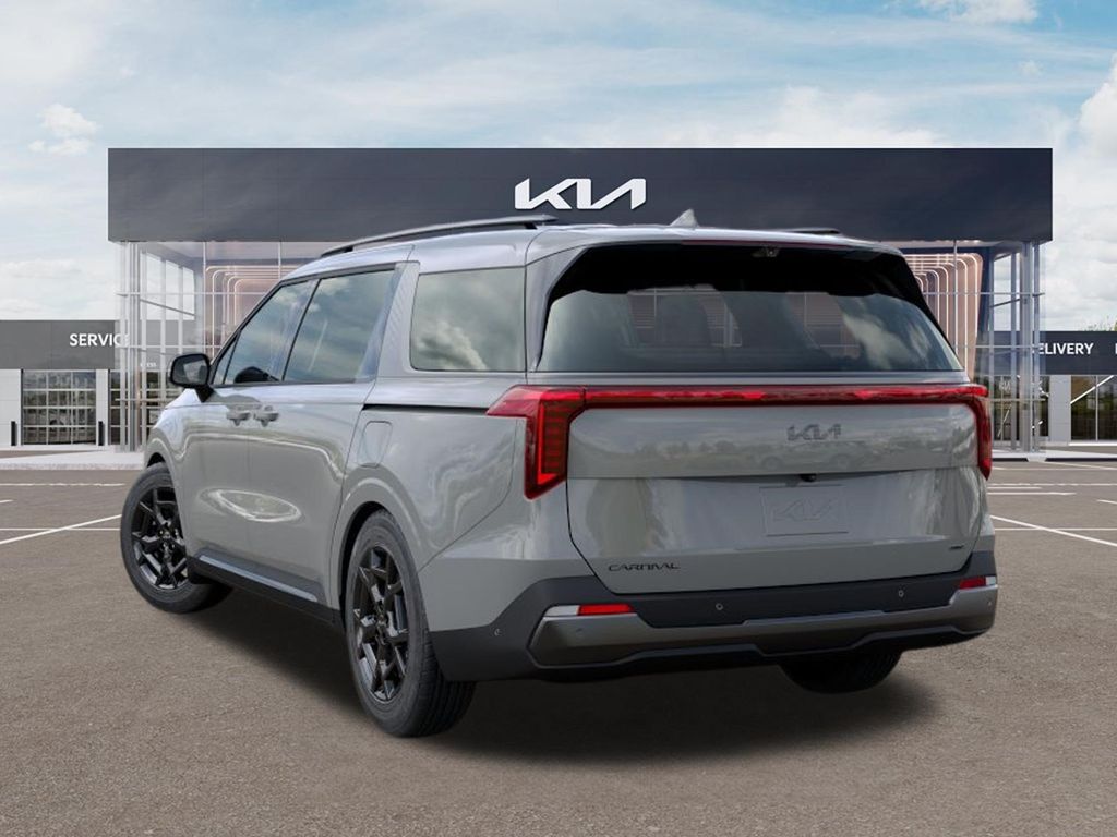 2027 Kia Carnival Hybrid SX PRESTIGE AUTO White at Shottenkirk Kia Fort Bend