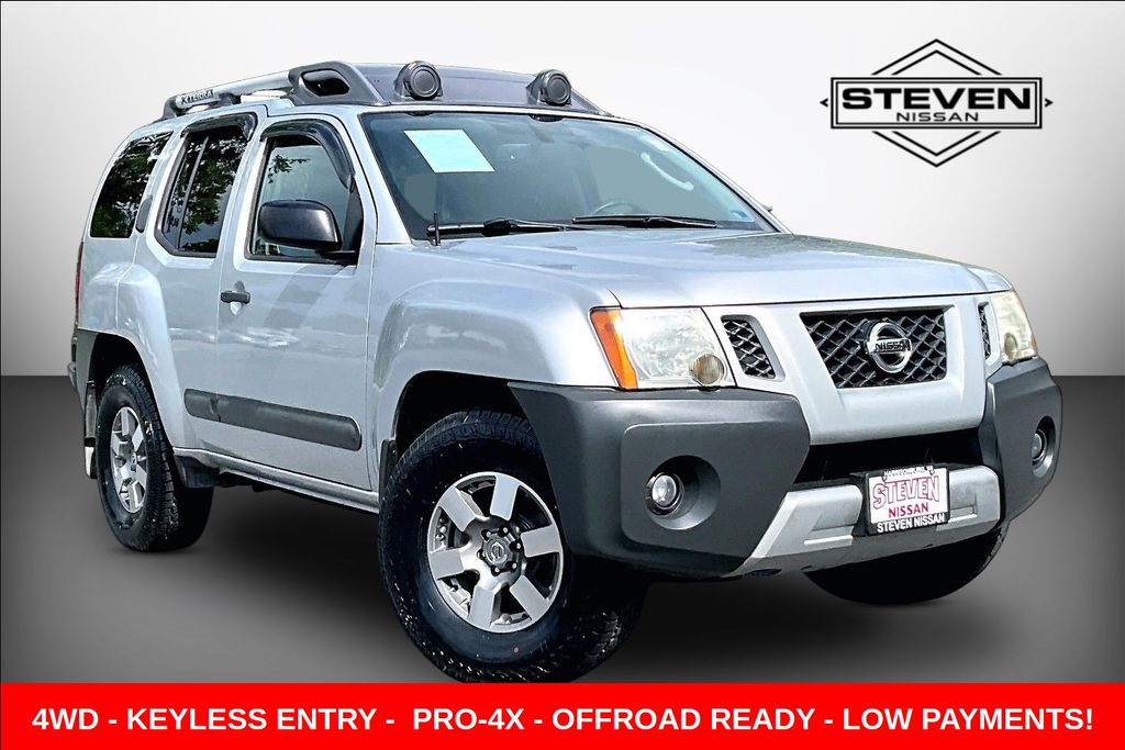 Silver Lightning Metallic 2011 Nissan Xterra SUV / Crossover 5-Speed Automatic