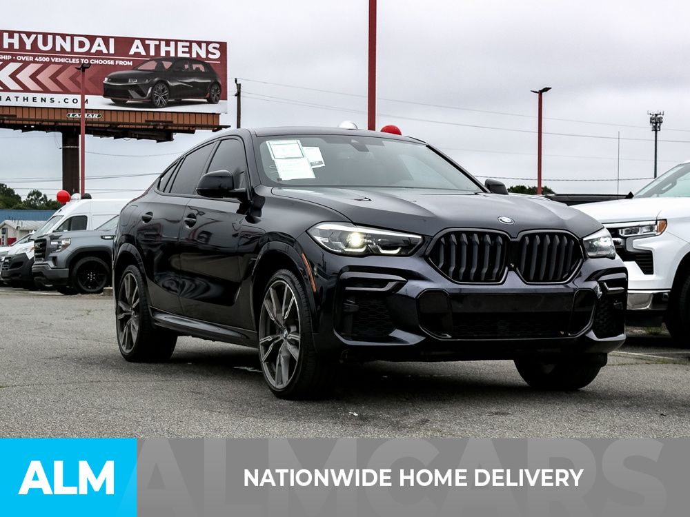 Used 2022 Black BMW M50i image 4