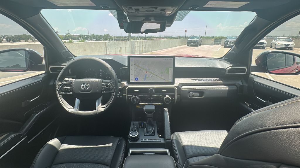 2026 Toyota Tacoma Hybrid Limited Red at EAG Ford Navasota
