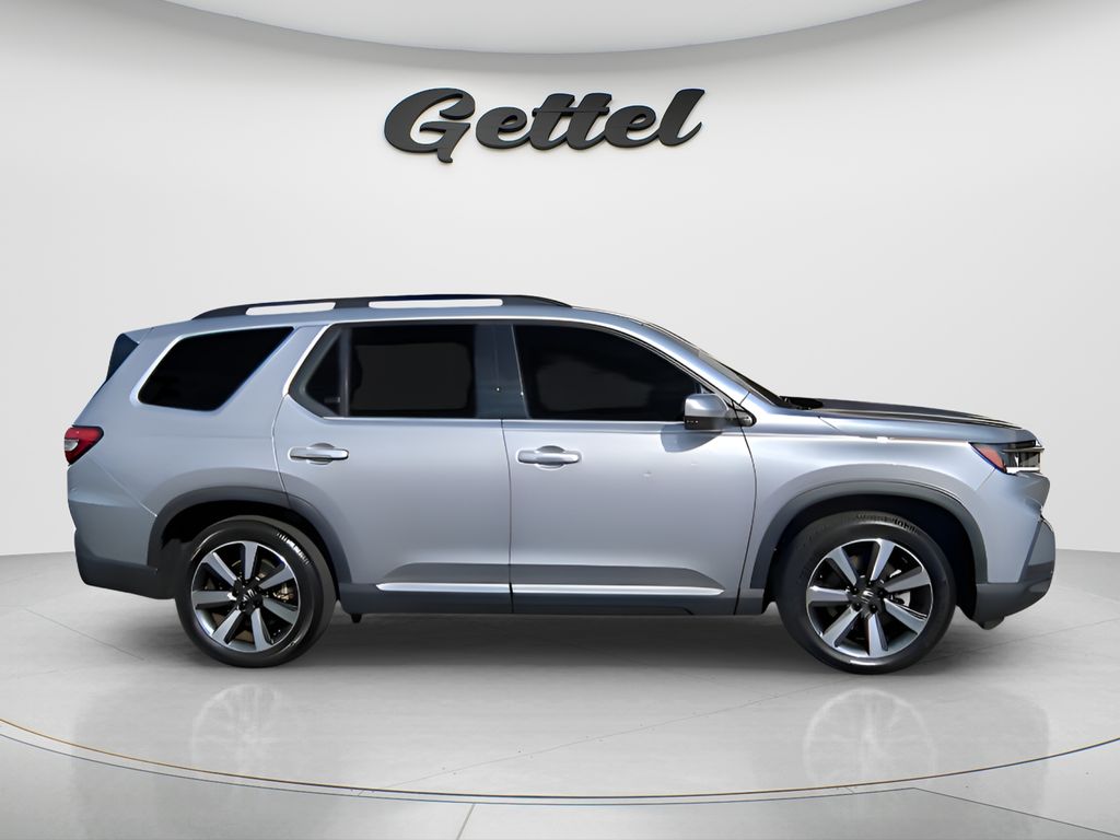 View vehicle photo 4