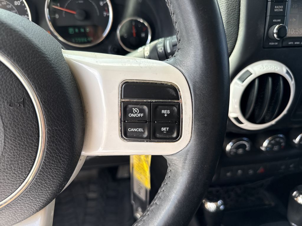 2015 Jeep Wrangler Unlimited Sahara Yellow at Parkway Family Mazda