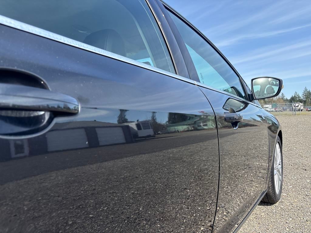 2014 Tuxedo Black Metallic Ford Focus Titanium FWD Hatchback