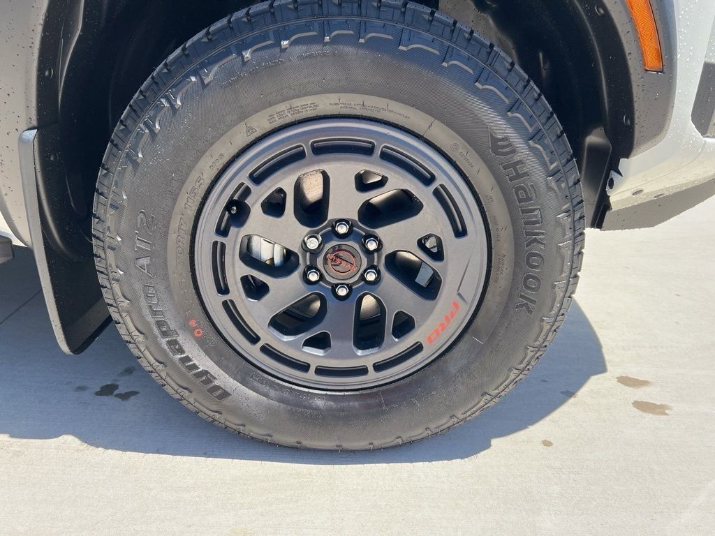 2025 Glacier White Nissan Frontier PRO-4X 4X4 Truck