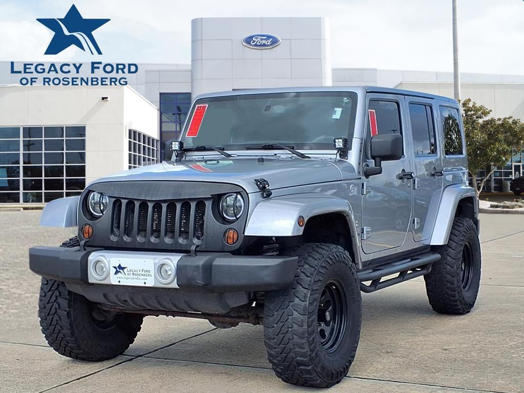 2013 Jeep Wrangler Unlimited Sahara Silver at Emmons Autoplex