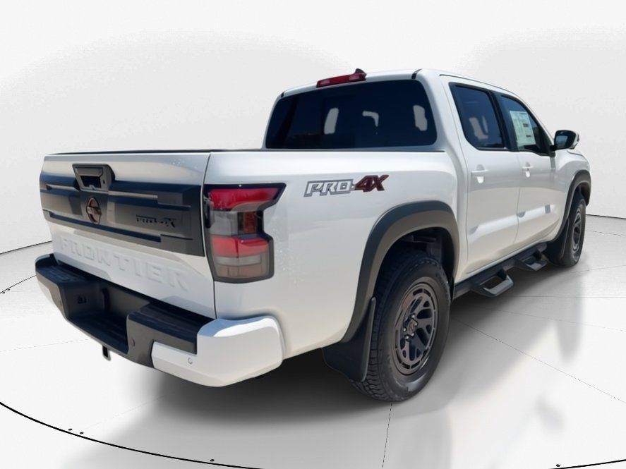 2025 Glacier White Nissan Frontier PRO-4X 4X4 Truck