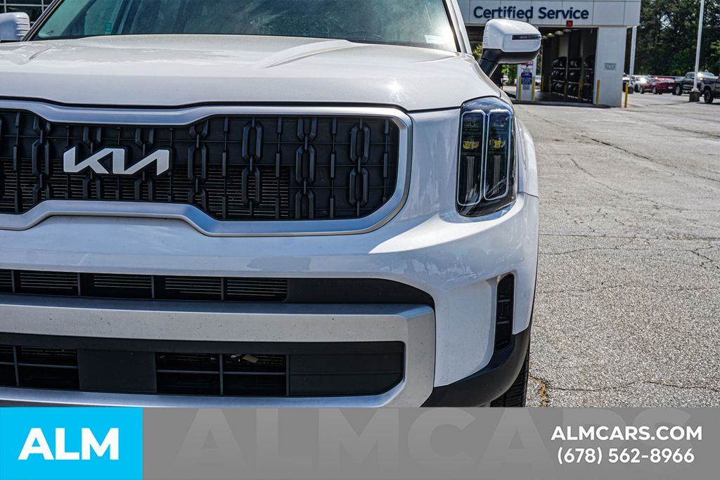 Used 2024 White Kia EX image 16