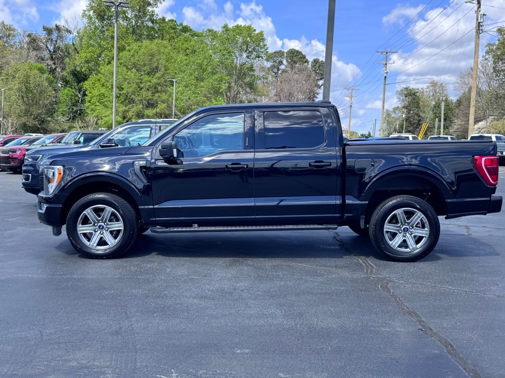 View vehicle photo 3