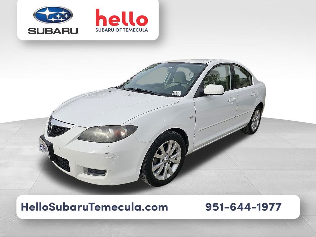 Rally White 2007 Mazda MAZDA3 i Touring Sedan Front-Wheel Drive 4-Speed Automatic