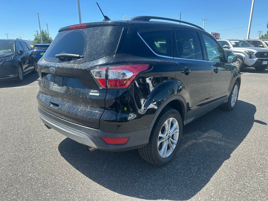 Used 2018 Ford Escape SEL with VIN 1FMCU0HD4JUB40261 for sale in Bozeman, MT