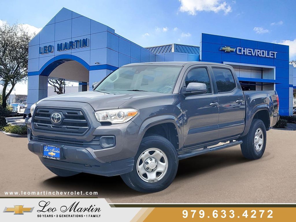 Magnetic Gray Metallic 2019 Toyota Tacoma SR I4 Double Cab RWD Pickup Truck 4X2 6-Speed Automatic