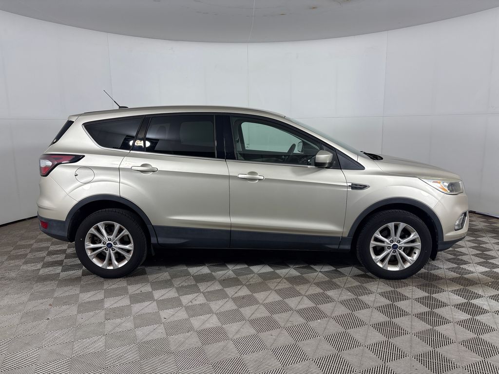Used 2017 Gold Ford SE image 2